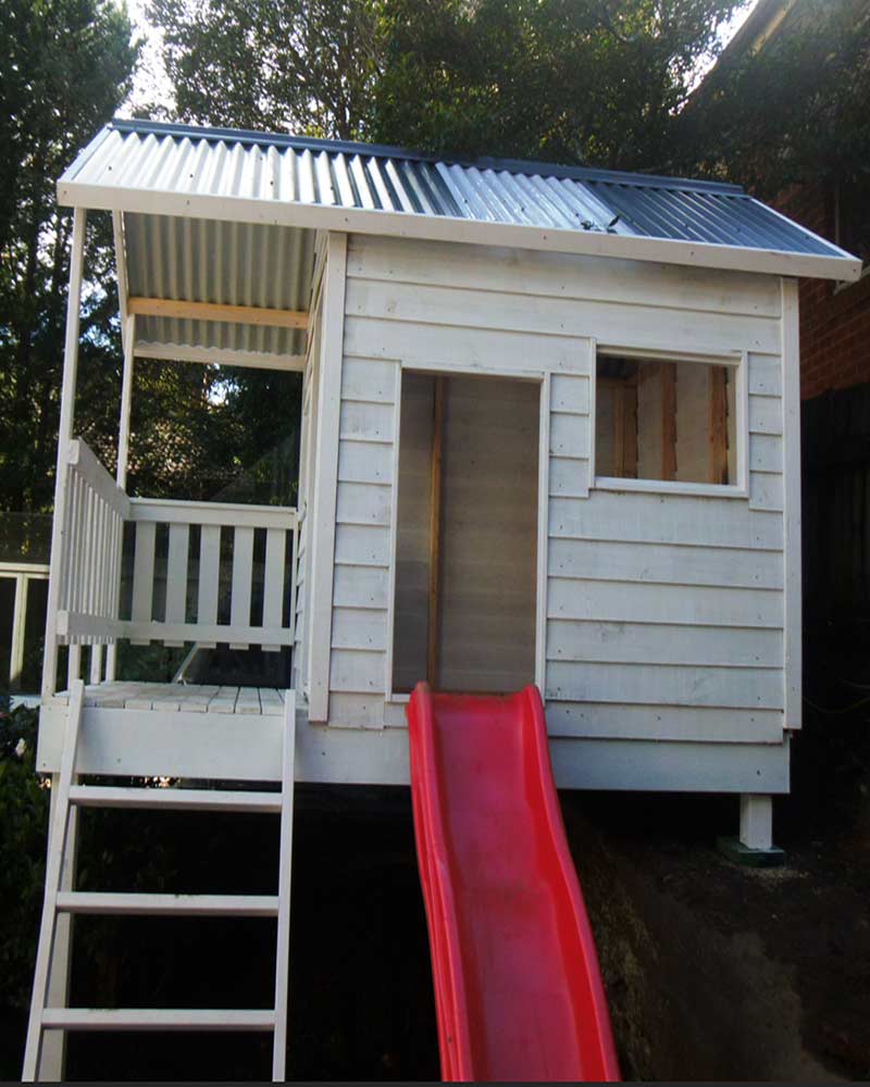 elevated cubby with step ladder and red slide suits DIY delivered in Sydney, painted white